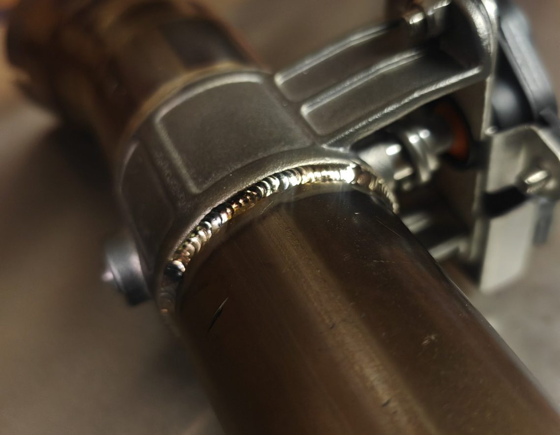 DB silencer (titanium) TIG welded into exhaust  